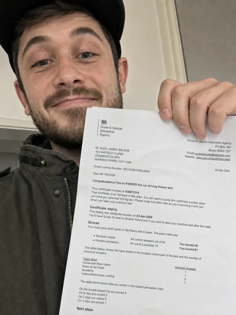 Illustrative learner taking a casual selfie with a theory-test pass letter